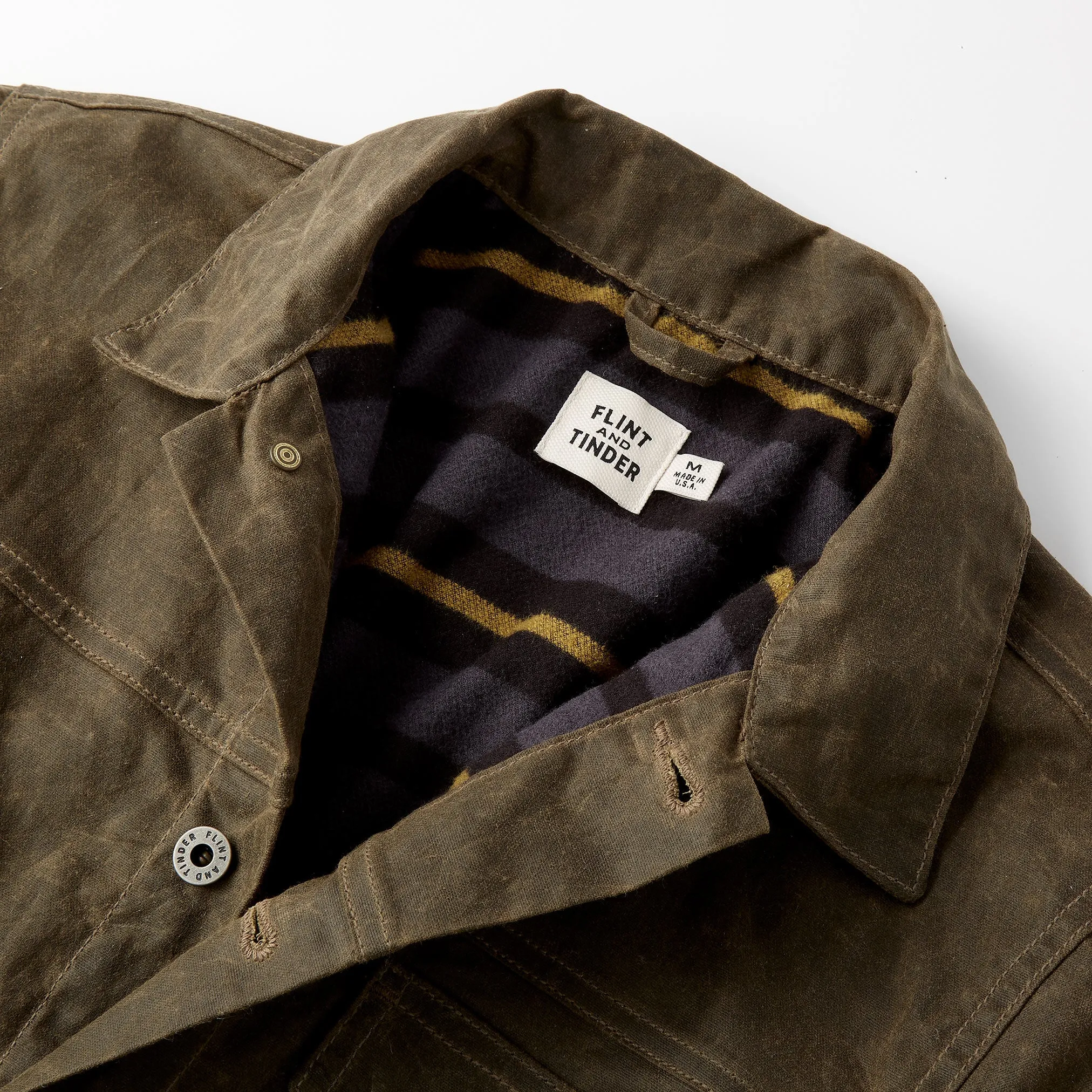 Flannel-Lined Waxed Trucker Jacket in Forest